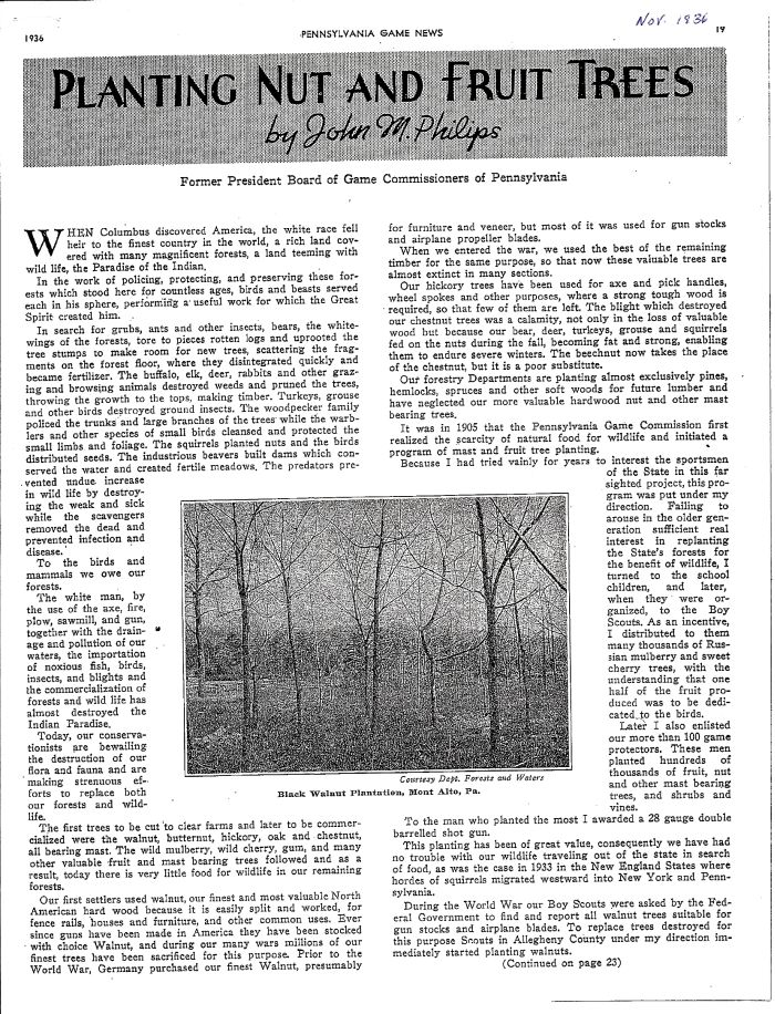 John m phillips planting nut and fruit trees 1.jpg